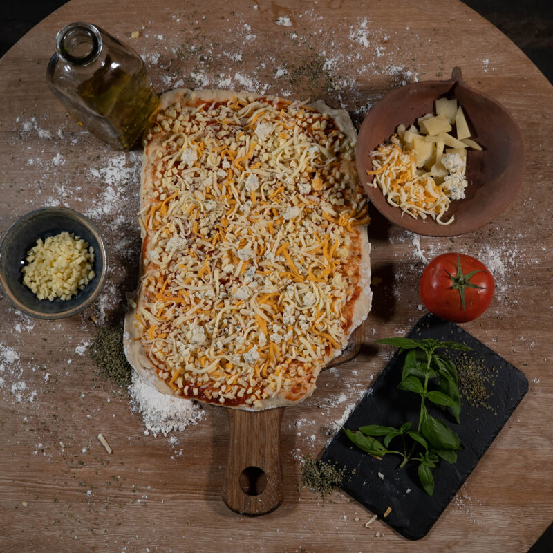 Pizza artesana cruda La Panpinela Prehistoria